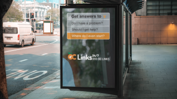 Bus stop advertisement display, displaying information about OC Links, a mental health resource